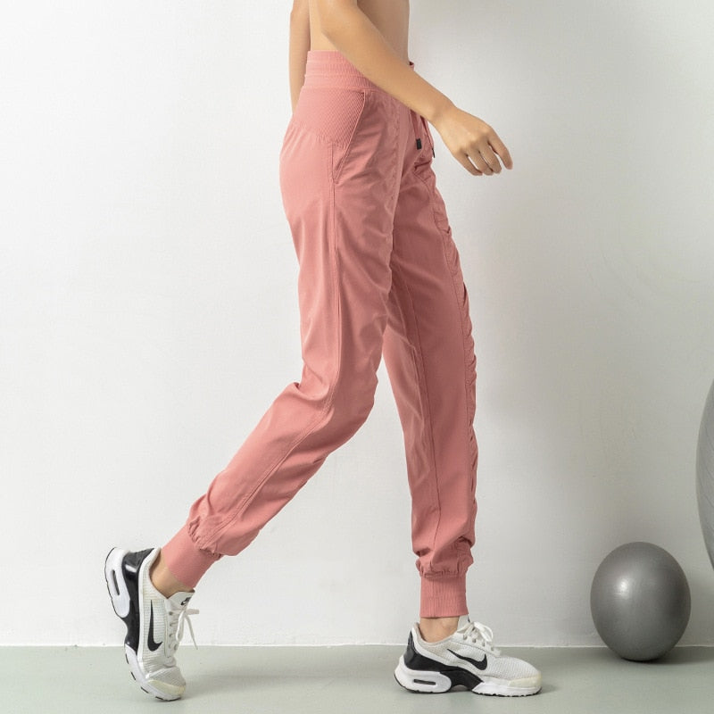 Quick dry spring/summer 2023 running the jogger women running the gym shorts has two side pockets sweatpants Fold show thin