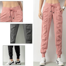 Load image into Gallery viewer, Quick dry spring/summer 2023 running the jogger women running the gym shorts has two side pockets sweatpants Fold show thin
